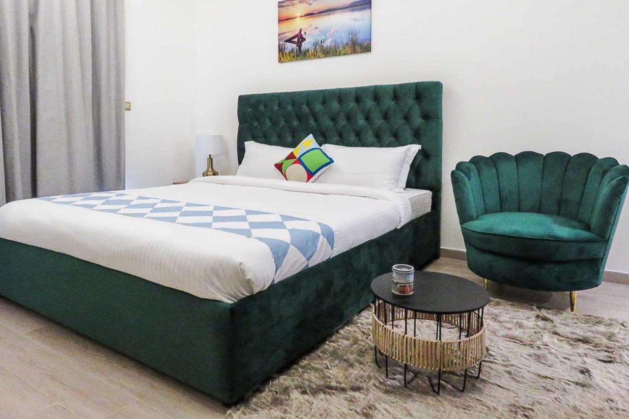 Oyo 860 Studio Apartment, Maya Tower 4, Jumeirah Village Triangle Dubaj Kültér fotó