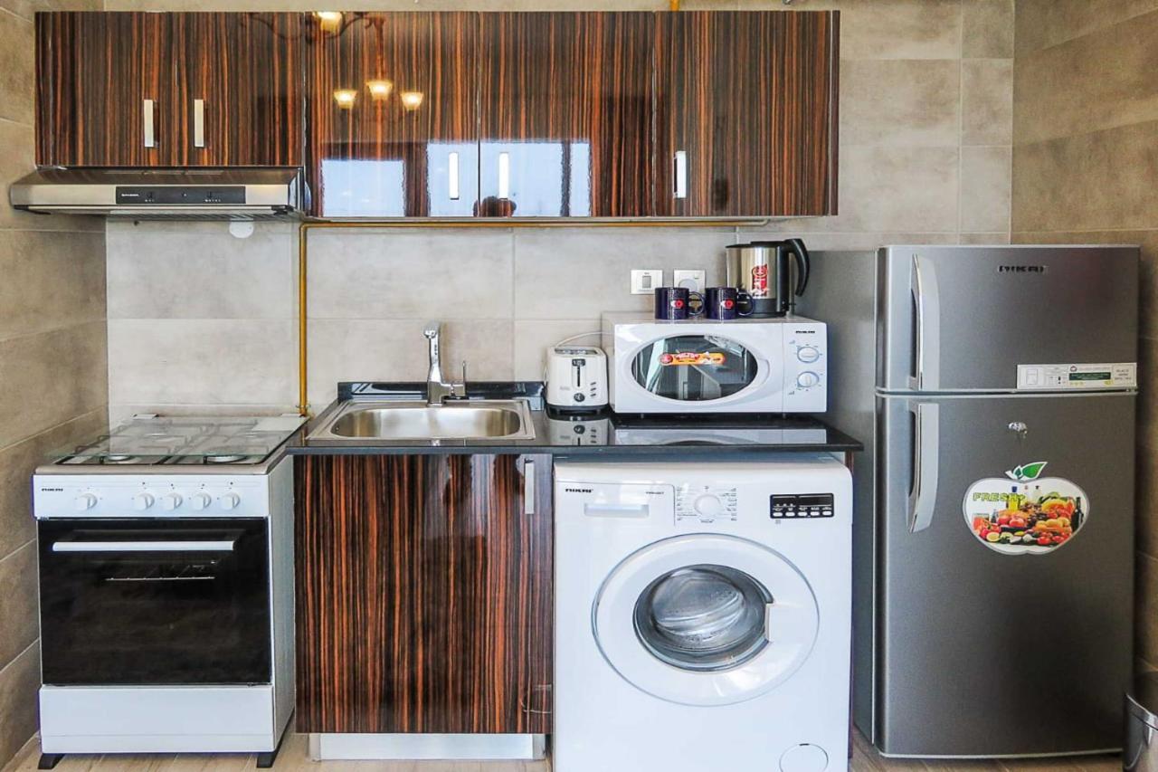 Oyo 860 Studio Apartment, Maya Tower 4, Jumeirah Village Triangle Dubaj Kültér fotó