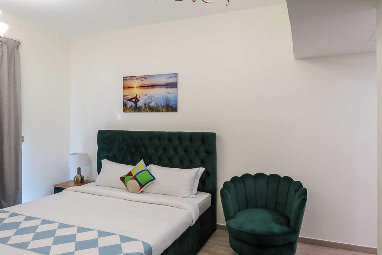 Oyo 860 Studio Apartment, Maya Tower 4, Jumeirah Village Triangle Dubaj Kültér fotó