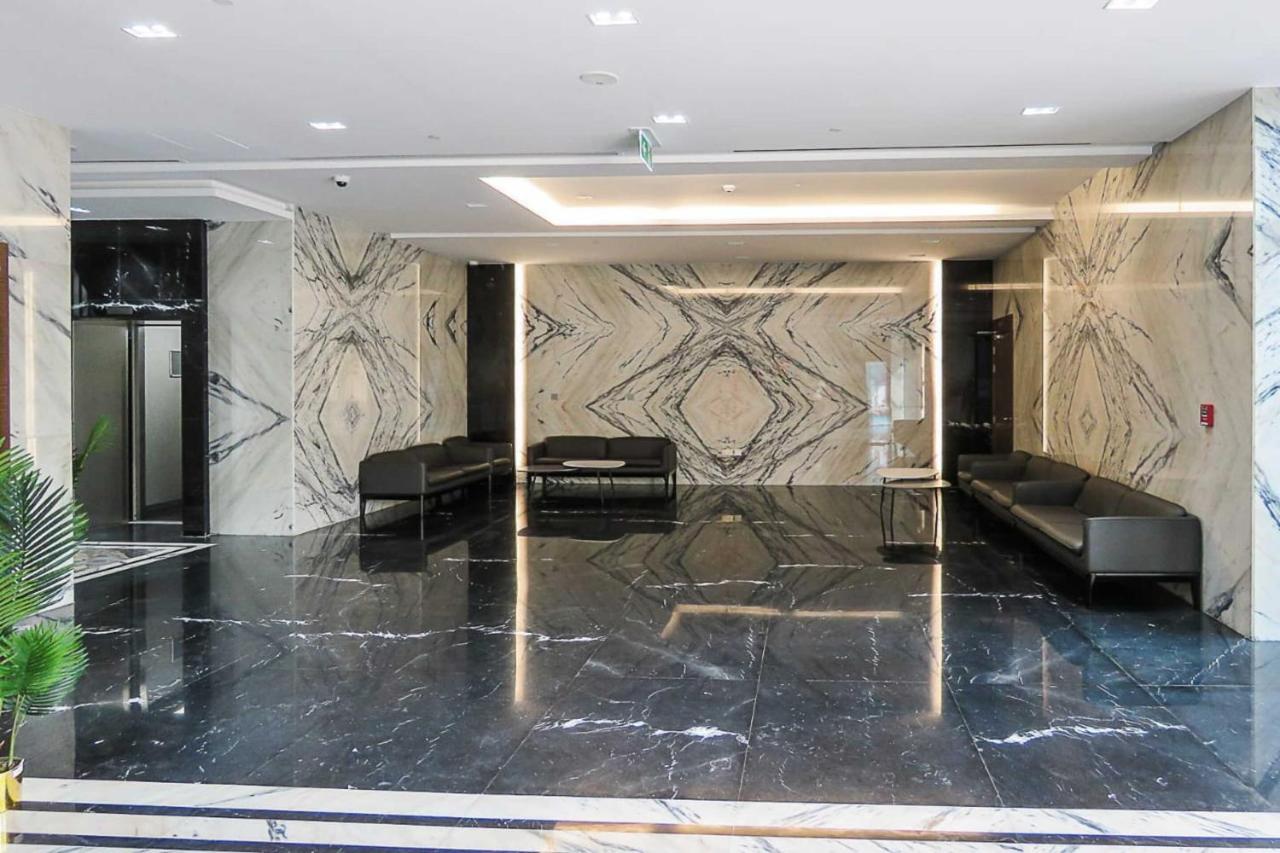 Oyo 860 Studio Apartment, Maya Tower 4, Jumeirah Village Triangle Dubaj Kültér fotó