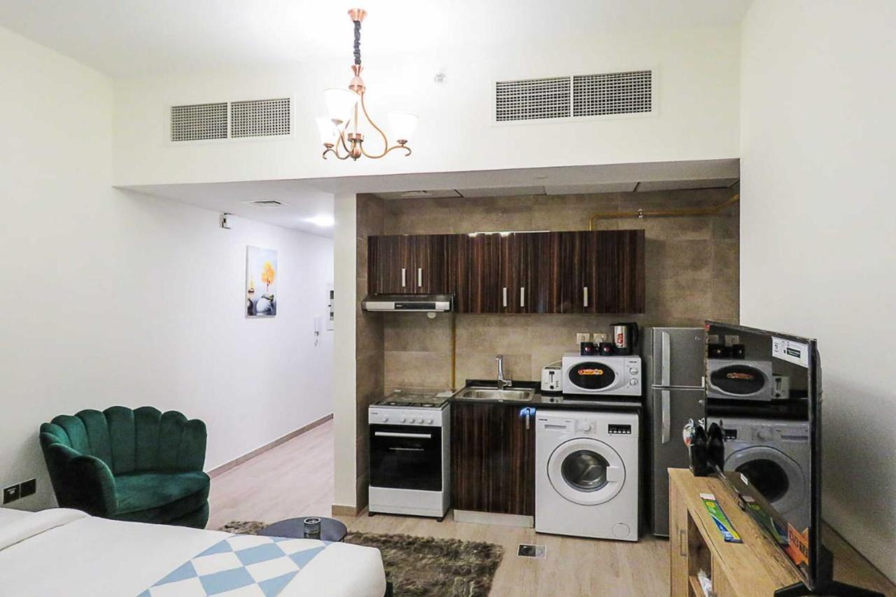 Oyo 860 Studio Apartment, Maya Tower 4, Jumeirah Village Triangle Dubaj Kültér fotó