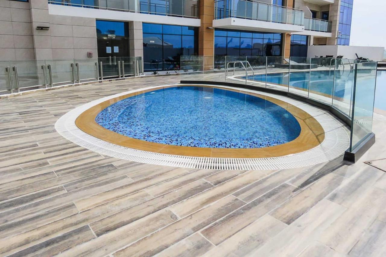 Oyo 860 Studio Apartment, Maya Tower 4, Jumeirah Village Triangle Dubaj Kültér fotó